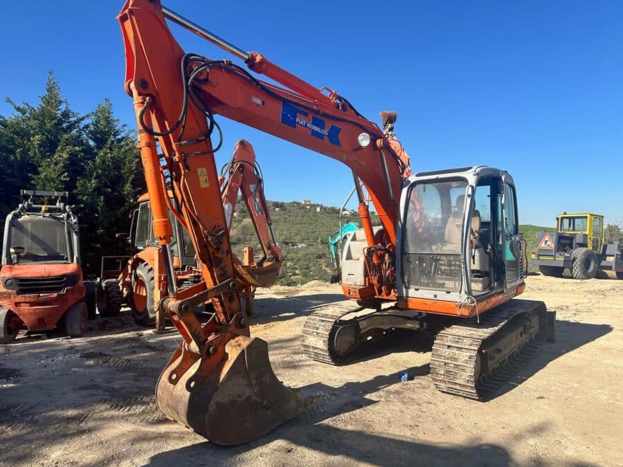 Escavatore cingolato FIAT KOBELCO E115SR usato 2003 con girosagoma, lama e impianto martello