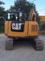 Rear view 2019 Caterpillar 308E2CR for sale in Foggia, used in excellent condition.