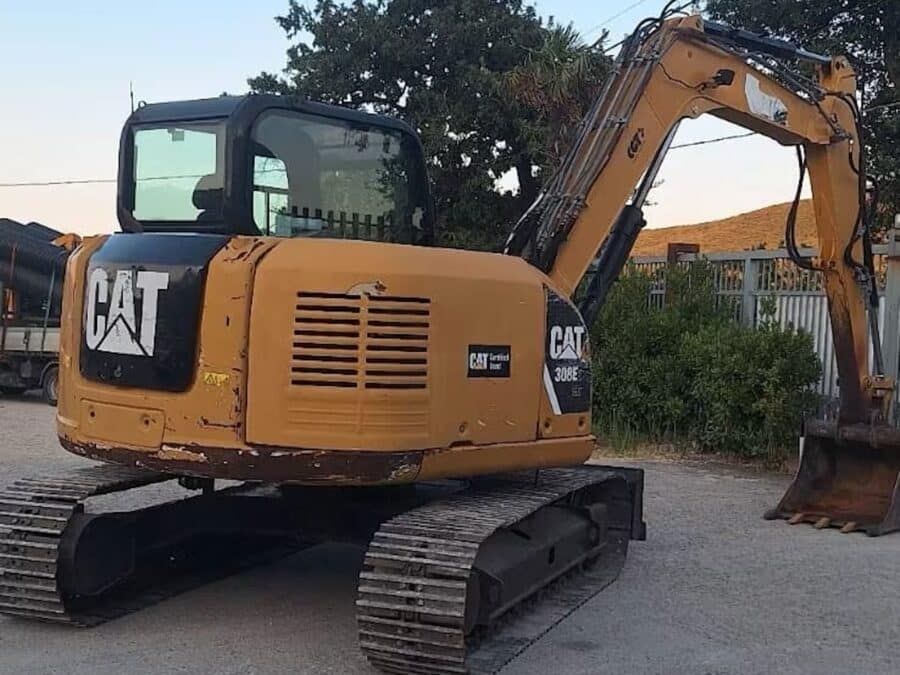 Rear view 2019 Caterpillar 308E2CR for sale in Foggia, used in excellent condition.