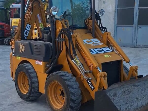 2002 JCB 1CX backhoe loader for sale in Foggia, compact and reliable machine with two digging buckets.