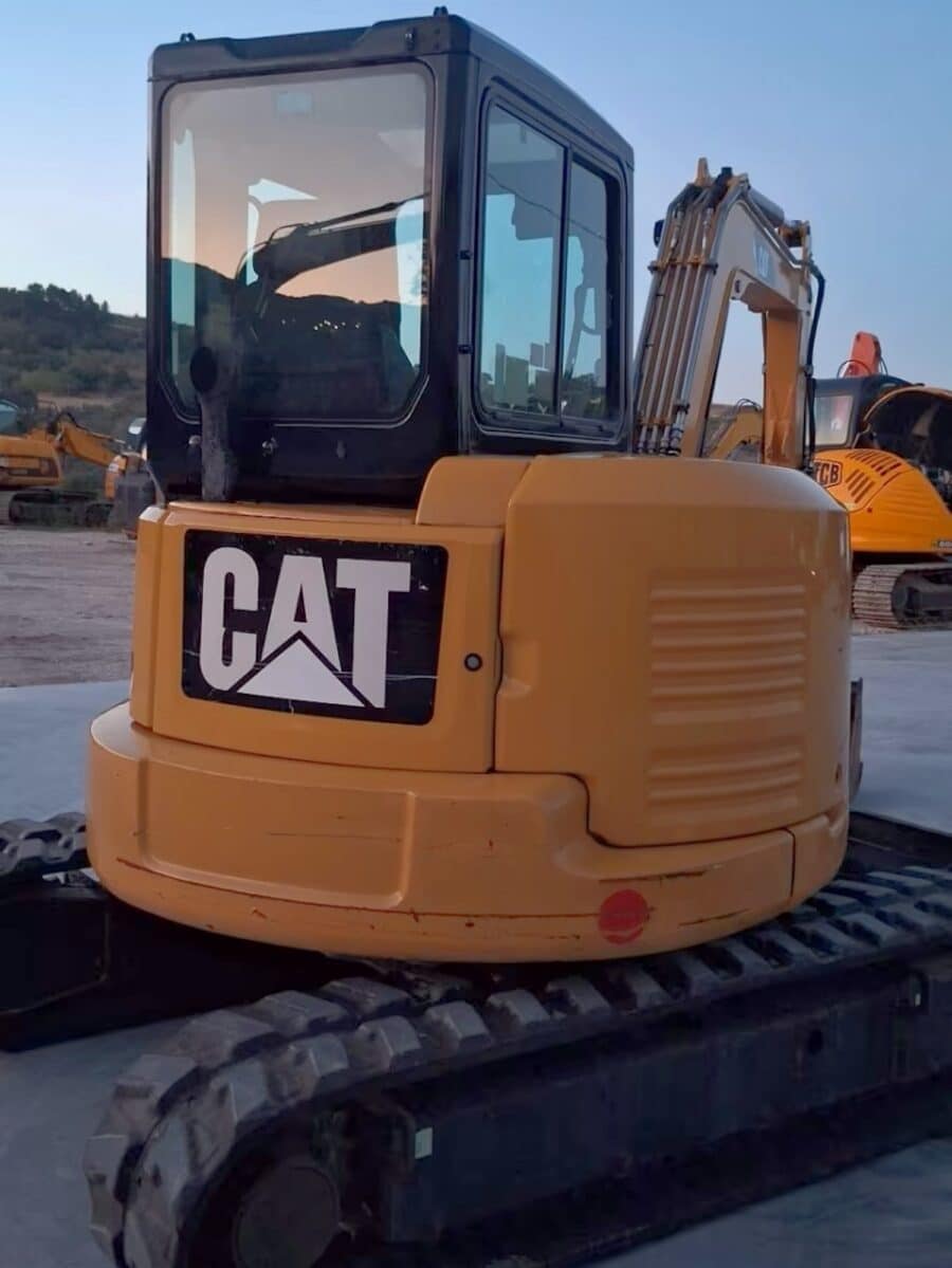 Rear view 2018 Caterpillar 305E2CR for sale in Foggia, used in excellent condition.