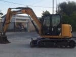 Side view 2019 Caterpillar 308E2CR for sale in Foggia, used in excellent condition.