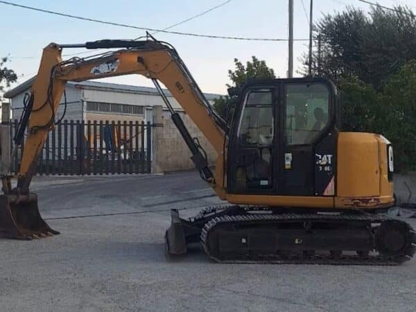 Side view 2019 Caterpillar 308E2CR for sale in Foggia, used in excellent condition.