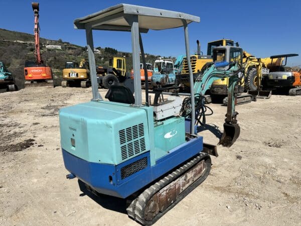 Miniescavatore UTEX 1.3 usato del 1997 con benna da scavo e impianto martello idraulico, disponibile a Foggia