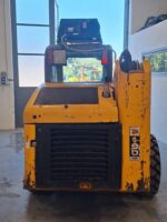Vista lateral de la cargadora de ruedas JCB 190HF en venta en DAMAC