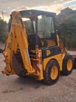Vista posteriore terna JCB 1CX HF in vendita a Foggia