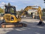 Side view Komatsu PC55MR-3 compact mini excavator for sale - DAMAC