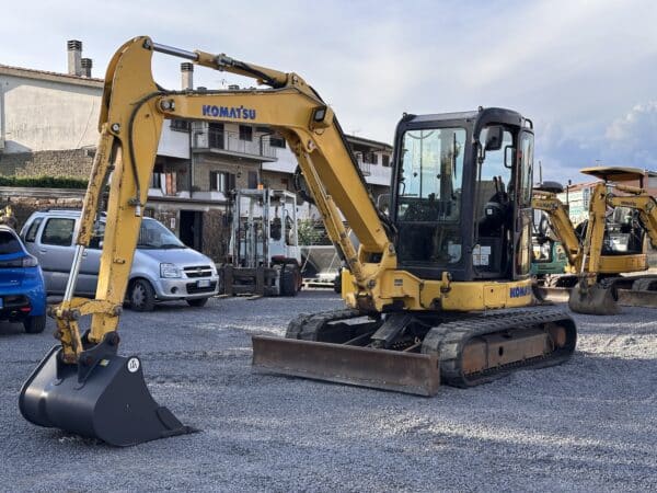 Side view Komatsu PC55MR-3 compact mini excavator for sale - DAMAC