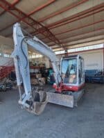 Front view of used 2002 Takeuchi TB135 mini excavator for sale in Rome, Italy