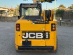 Vista posteriore minipala gommata JCB 225 del 2012 in vendita da DAMAC