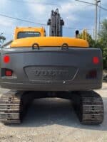 Vista posteriore VOLVO EC140BLC usato in vendita da DAMAC