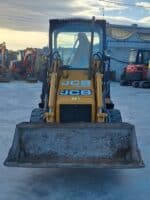 Front view 2002 JCB 1CX for sale in Foggia, compact and reliable machine with two digging buckets.