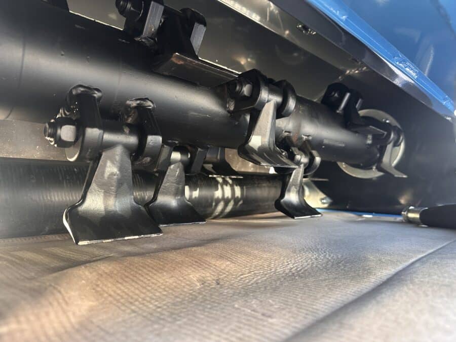 C4 B90 equipped with sledgehammers for forestry work.