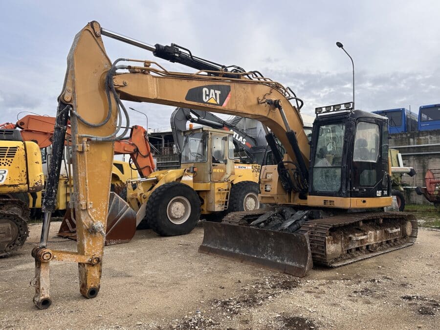 CATERPILLAR 314D ATXN00204 1 Caterpillar 314D excavator front view on DAMAC Rome yard