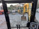 vista frontale interno cabina jcb 85z-1