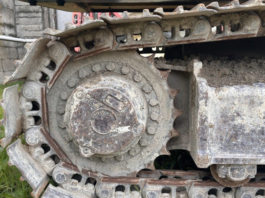 Escavatore New Holland E215B ruota dentata destra