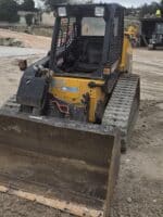 Minipala JCB 190HF vista frontale con benna montata