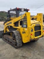 Minipala Komatsu CK20 vista laterale posteriore in esposizione DAMAC