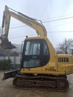 escavatore Komatsu PC60 usato vista laterale