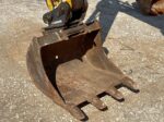 Komatsu PC26MR-3 dettaglio benna con attacco rapido cangini