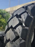 Aggressive tread pattern Malhotra 10-16.5 skid steer tire