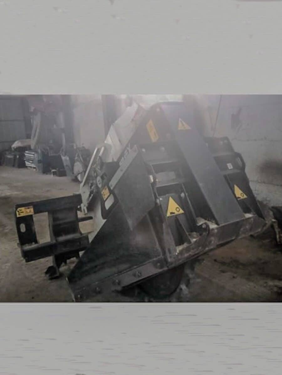 Simex RW500 trenching wheel mounted on skid steer