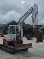 Takeuchi TB153 vista frontale lama stabilizzatrice