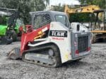 Takeuchi TL6R vue latérale complète avec châssis chenillé.