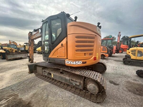 Escavatore cingolato Case CX145D SR usato, vista posteriore sinistra